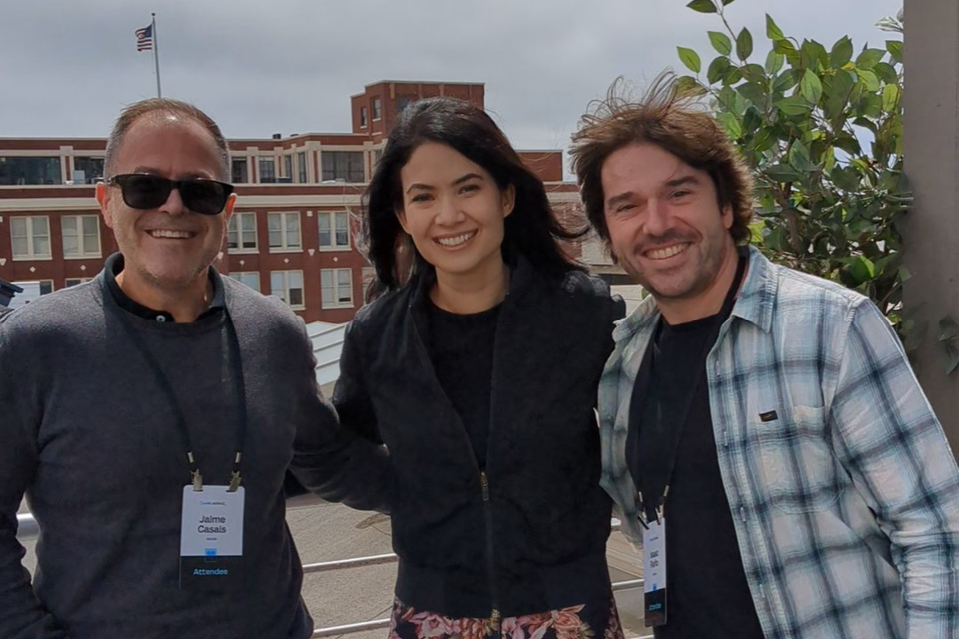 Melanie Perkins with Jaime Casals and Isaac Raño from DataPocket at Canva Extend